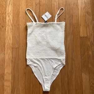 Brand new white ruched bodysuit